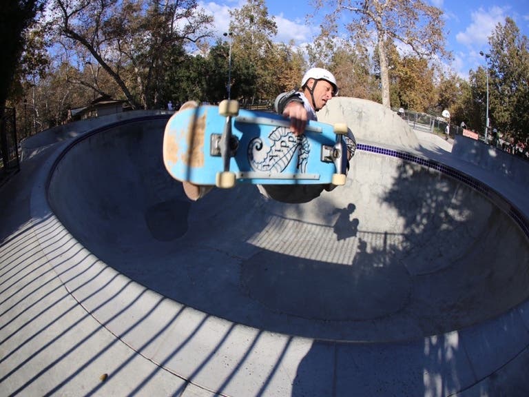 A skateboarder catches air at Verdugo Skate Park