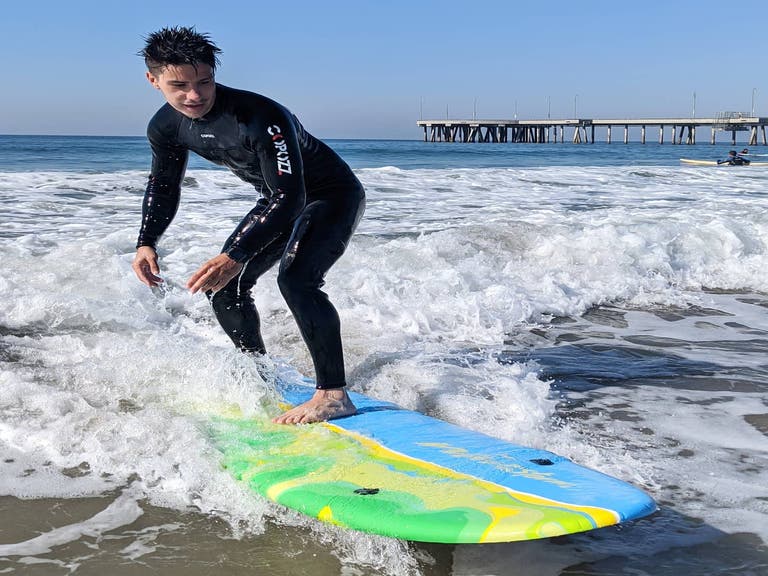 Golden Wave Surf School surfer