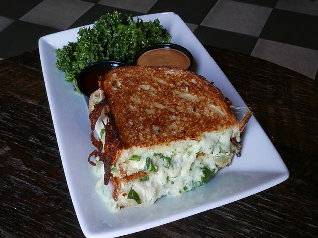 Artichoke spinach dip grilled cheese at Blind Barber | Photo by Joshua Lurie
