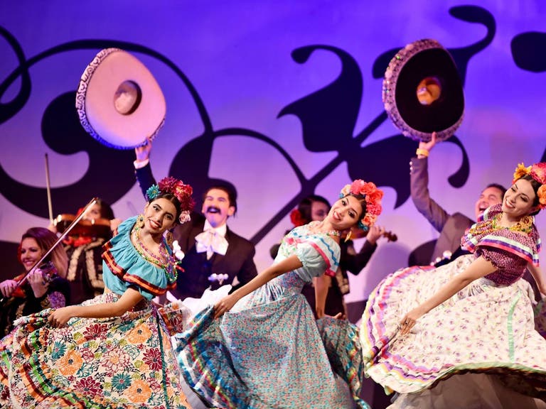 Dancers perform at the U.S. premiere of "Coco" at El Capitan Theatre