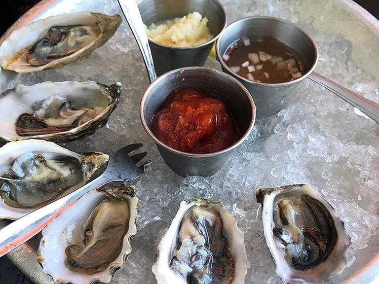 $1 oysters and $5 chilled vodka shots at Pearl's Rooftop
