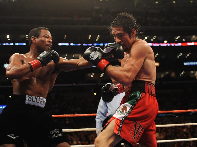 "Sugar" Shane Mosely lands a punch on Antonio Margarito at STAPLES Center