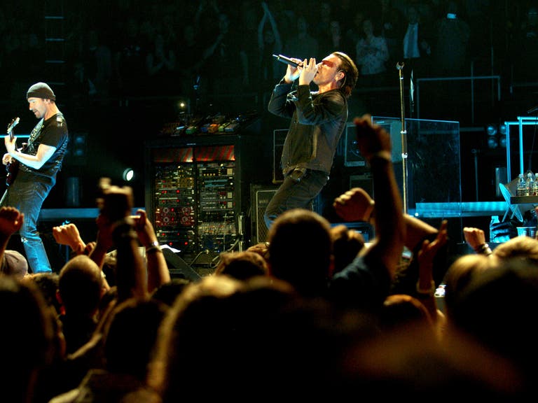 U2's The Edge and Bono performing at STAPLES Center on the Vertigo Tour
