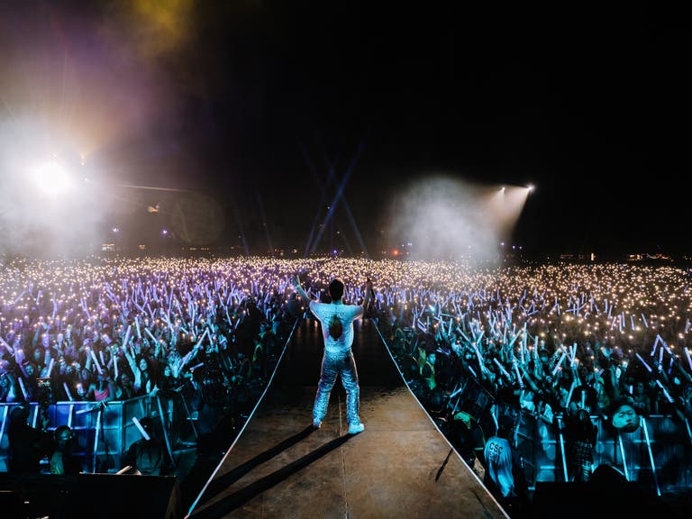 Rich Brian on stage at Head in the Clouds Festival