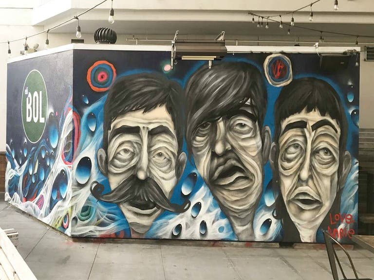 Face mural by Annie Preece at ediBOL | Instagram by @anniepreece